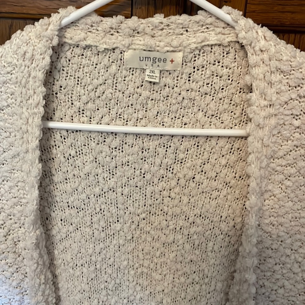 Popcorn cardigan. Cream in color. New without tags